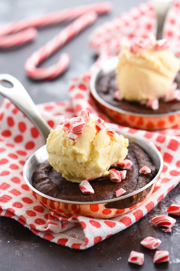 Double Peppermint Brownie Skillets for Two - Peppermint-infused brownies topped with vanilla ice cream and crushed candy cakes. Bake in mini skillets or ramekins for an adorable presentation! | foxeslovelemons.com