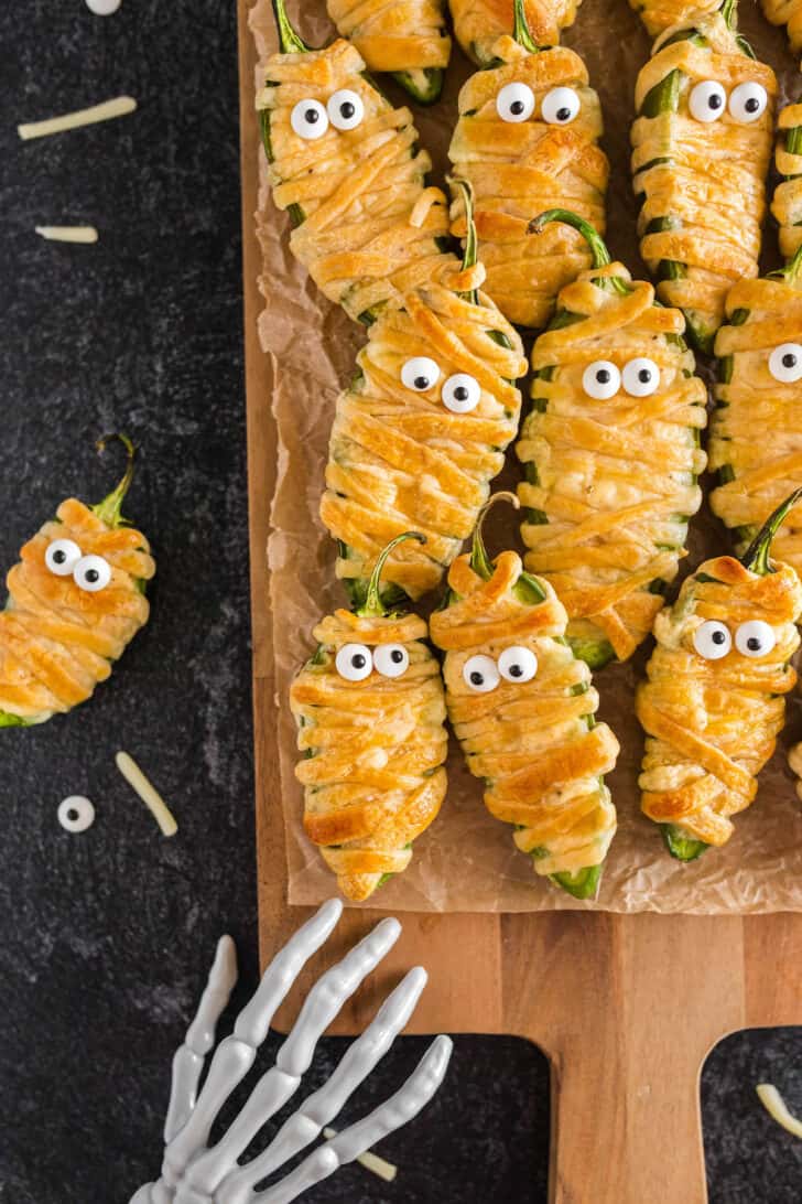 Jalapeno poppers mummies with candy eyeballs.